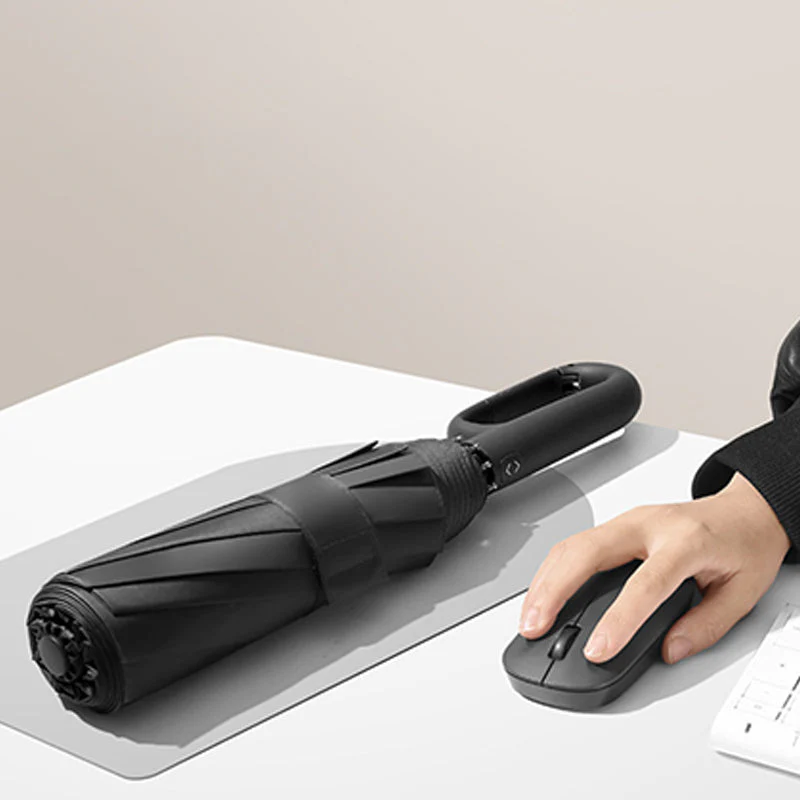 Compact Folding Umbrella with UV Protection for Sun and Rain - Image 8